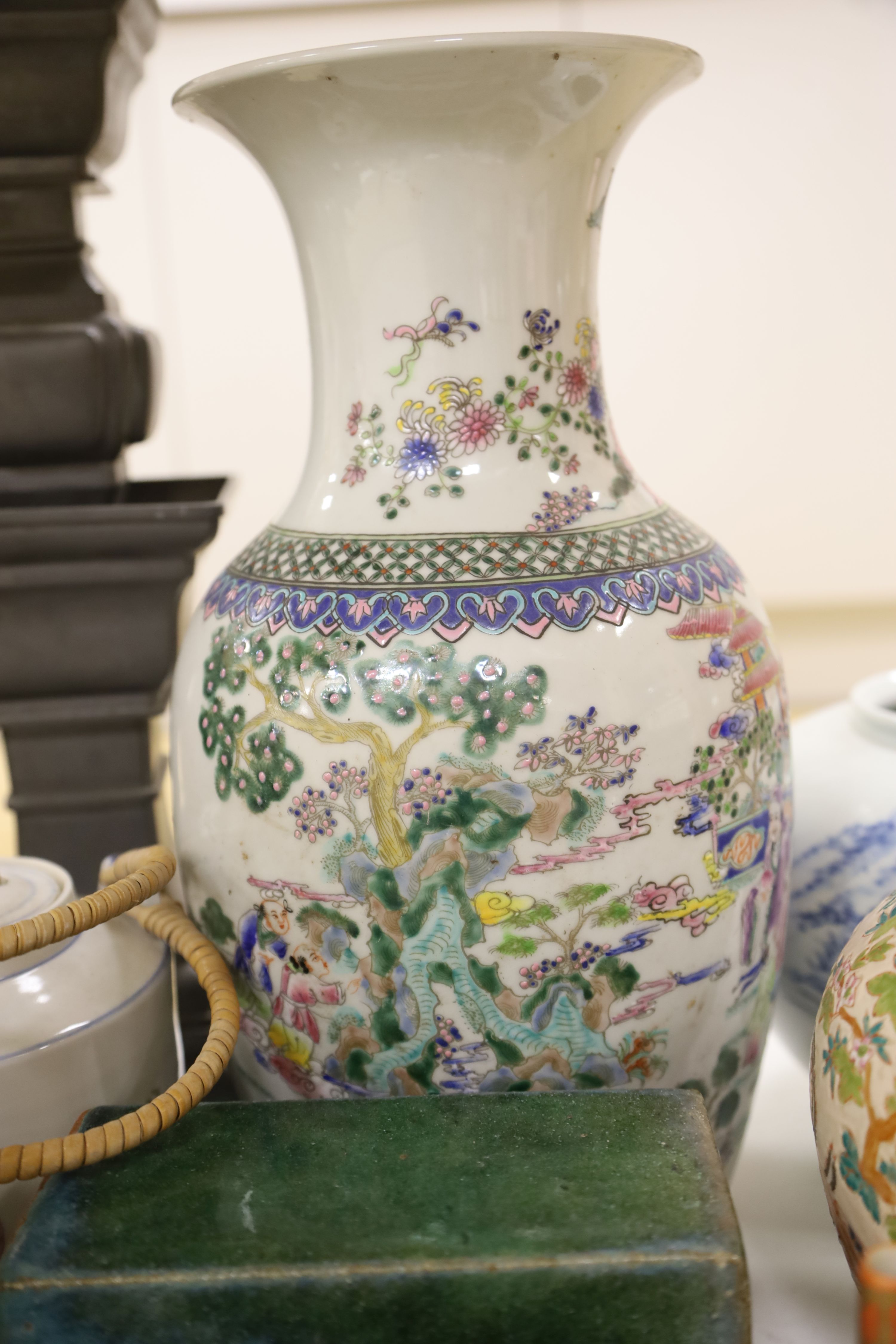 A Chinese famille rose vase, two teapots, mixed Chinese and Japanese ceramics and a lamp